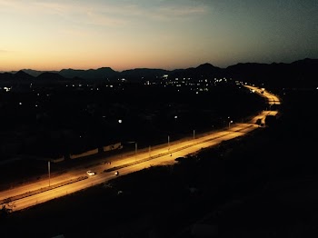 Aerial Photo of Road With Vehicle Traveling during Nighttime