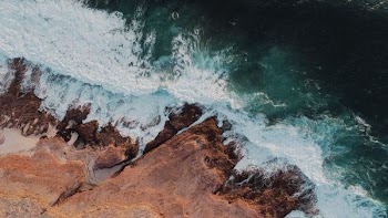 aerial photo of sea and sands