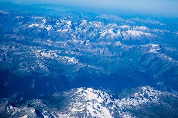 aerial photo of snow covered mountains
