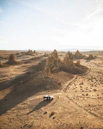 Aerial Photo of Vehicle Near Rock Formations