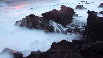aerial photograph of mountain shore
