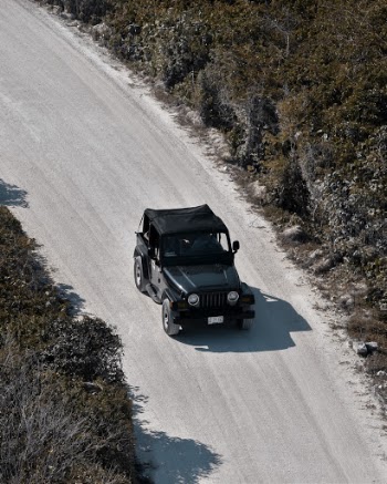 Aerial Photography of Black Jeep SUV on Road