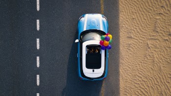 Aerial Photography of Blue Car on Road