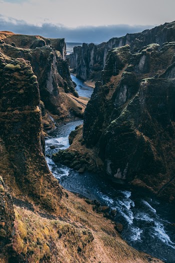 Aerial Photography of Blue River Between Mountains