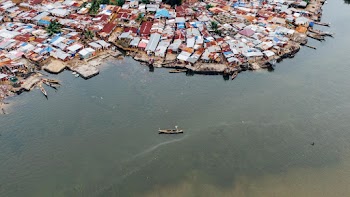 Aerial Photography of Boat in Body of Water