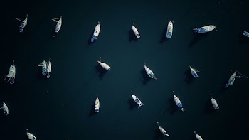 aerial photography of boat on body of water