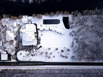 Aerial Photography Of Building Covered With Snow