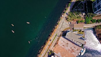 Aerial Photography of Building Near Body of Water