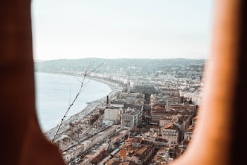 Aerial Photography of Buildings Beside Shore
