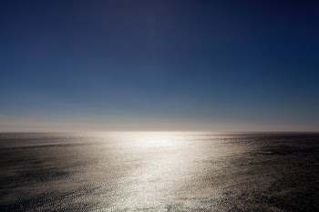 aerial photography of calm sea under blue skies