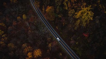 aerial photography of car cascading on highway