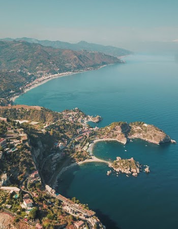 Aerial Photography of City and Body of Water