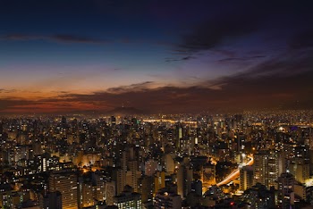 Aerial Photography of City Buildings Under Blue and Orange Sky