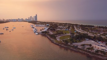 Aerial Photography of City Near the Body of Water during Golden Hour