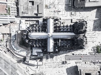 aerial photography of cross-shaped building