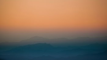 aerial photography of fog mountain