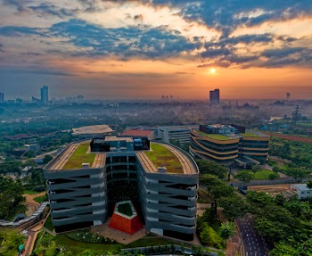 Aerial Photography of Gray Building during Sunset