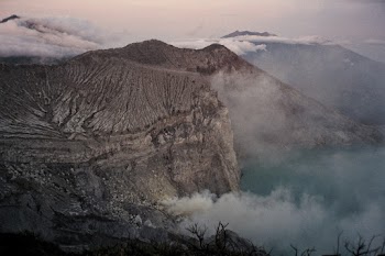 Aerial Photography of Gray Mountain With Smokes during Golden Hour