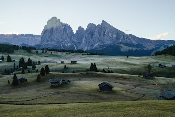 Aerial Photography of Green Field near a hill