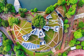 Aerial Photography of House Beside Body of Water