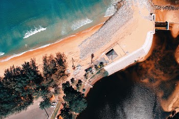 Aerial Photography of House Near Body of Water