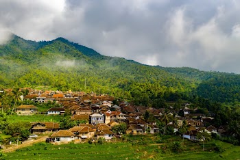 Aerial Photography of House Near Mountain