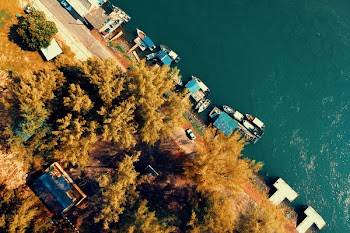 Aerial Photography of House Near Water