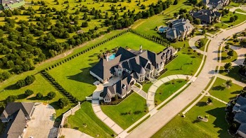 aerial photography of house with green yard