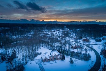 aerial photography of houses covered with snows