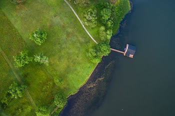 aerial photography of island beside house