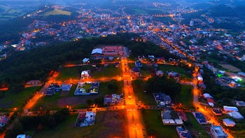 Aerial Photography of Lighted Houses Taken during Nighttime