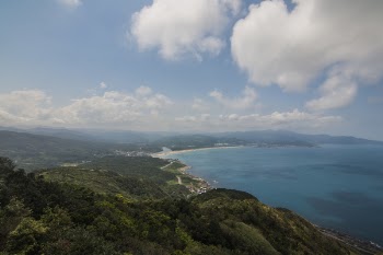 Aerial Photography of Mountain and Body of Water