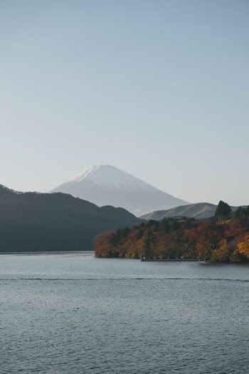 aerial photography of mountain and river view during daytime