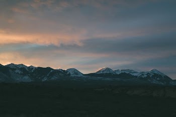 aerial photography of mountain at sunset