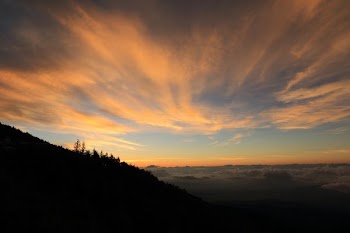 aerial photography of mountain range under golden hour