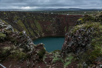 Aerial Photography of Mountain Under Gray Clouds