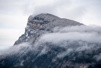 Aerial Photography of Mountain With Clouds