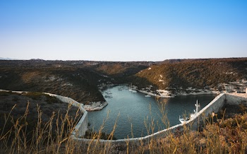 Aerial Photography of Mountains Near Body of Water