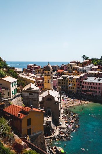 aerial photography of people standing on bay