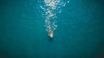 Aerial Photography of Person In A Kayak