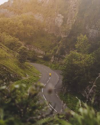 Aerial Photography of Person Waking on Road