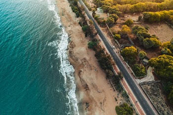 Aerial Photography of Road Near Seashore