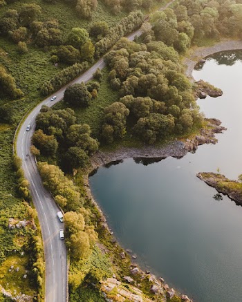 Aerial Photography of Roadway and Body of Water