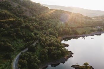 Aerial Photography of Roadway and Body of Water