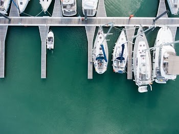 aerial photography of speedboats on body of water