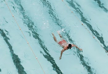 Aerial Photography Of Swimming Man
