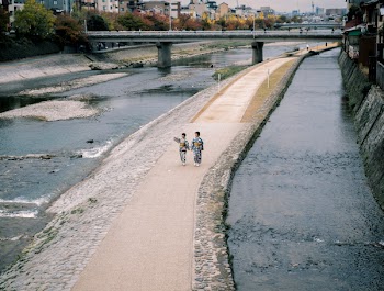 Aerial Photography of Two Women Walking on Pathway