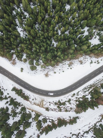 Aerial Photography of Vehicle at Road