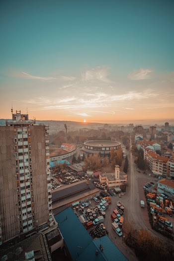 Aerial Photography of Vehicles Near Buildings