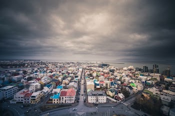 Aerial Photography of Village Near Large Body of Water